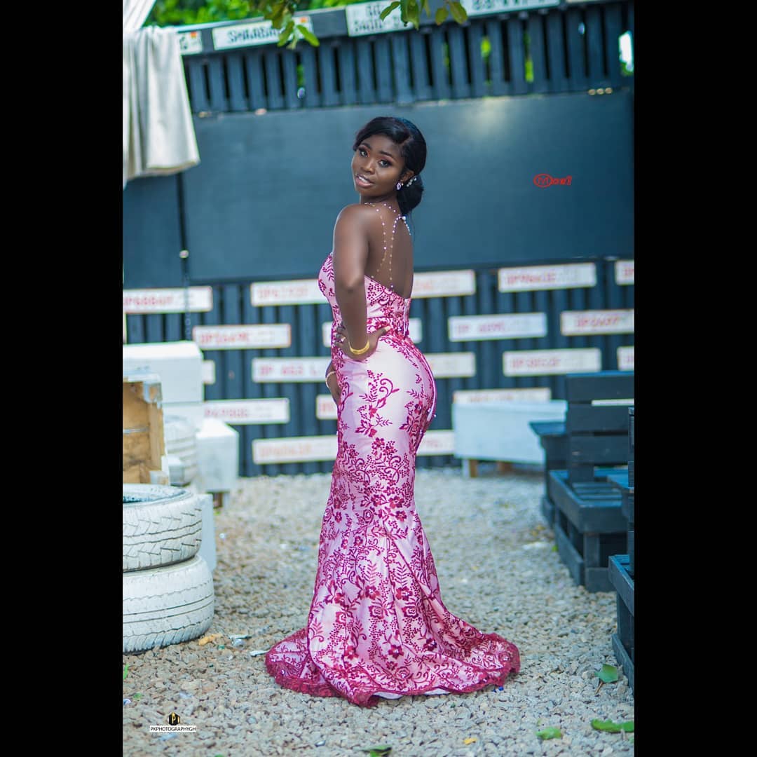 Traditional Ankara wax-print dress with matching fascinator